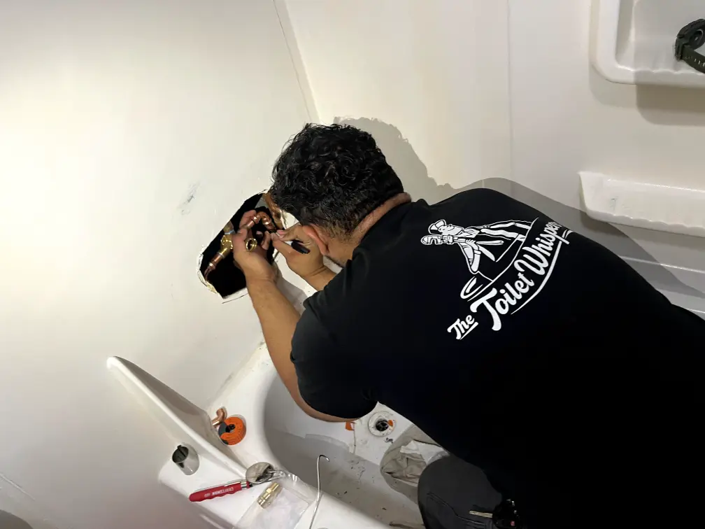 The Toilet Whisperer plumber working in a Roseville home